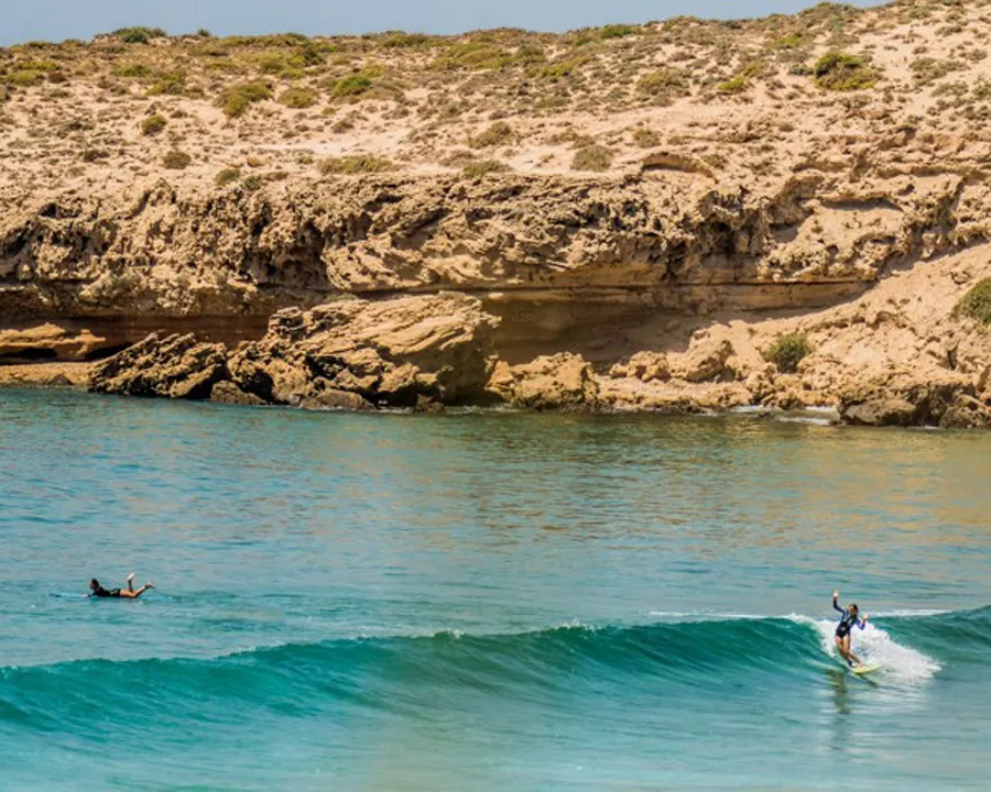 Riding a perfect left hand in Taghazout